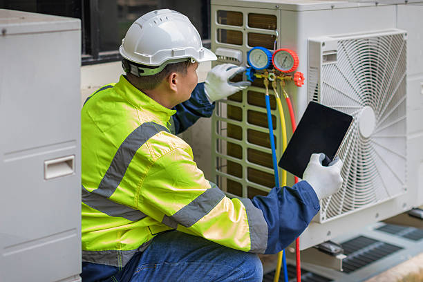 Professional Ductwork Repair technician working in Westport, MA